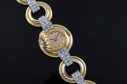 null PATEK PHILIPPE & Cie
Montre bracelet de dame en or jaune 18k et diamants. Boitier...