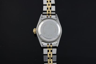 null ROLEX Date lady réf. 69173
Montre bracelet de dame or et acier. Boitier oyster...