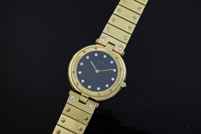 null CARTIER Santos round ref.8191
Wrist watch in 18k yellow gold. Round case with...