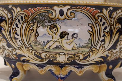 null GIEN. Important earthenware jardinière decorated with putti, the handles in...