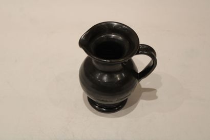 null JEAN MARAIS (1913-1998). Jug with handle in stoneware with black patina, signed...