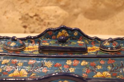 null Large enamelled ceramic inkwell decorated with polychrome flowers on a blue...