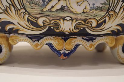 null GIEN. Important earthenware jardinière decorated with putti, the handles in...