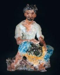 Geo LEONARDI (XXème siècle) Le pêcheur assis Sculpture en terre cuite émaillée et...