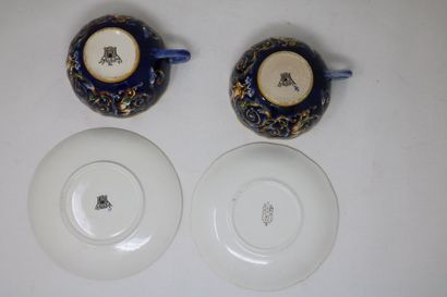 null GIEN - Deux tasses et soucoupes (modèles différents) en faience à décor Renaissance...