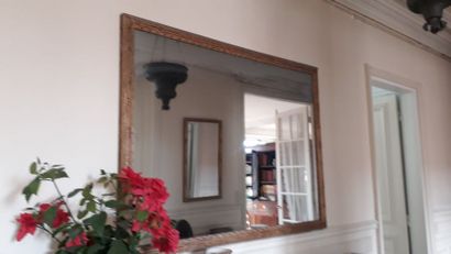 null Miroir rectangulaire en bois et stuc doré à décor de joncs noués

Style Louis...