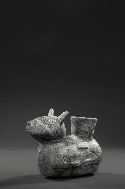 null Zoomorphic vase representing a lying lama. He is harnessed to carry burdens...
