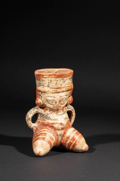 null Femme assise

Terre cuite polychrome

Culture Nicoya, style Chorotega, Costa...
