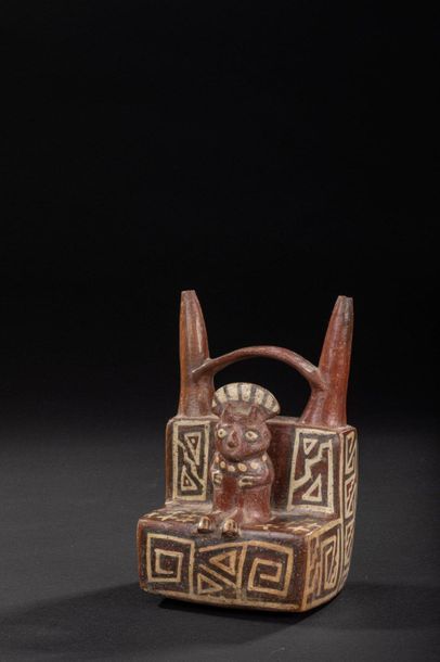 null Vase with double neck representing a figure sitting in the middle of a temple

Polychrome...
