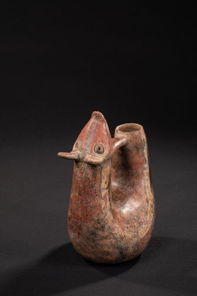 null Vase representing a rodent 

Lying on his back, his body forms a U. The head...