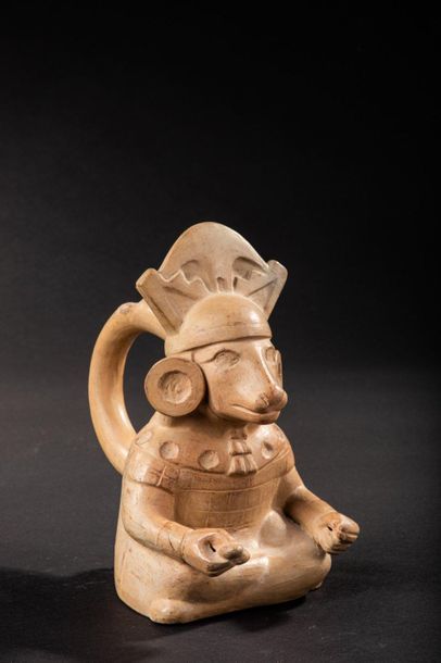 null Vase representing a shaman

Sitting in a suit, he wears a mask with the head...