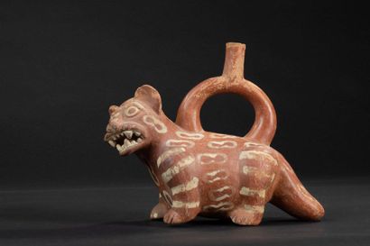null Vase with stirrup handle representing a jaguar

Standing on his legs, he opens...