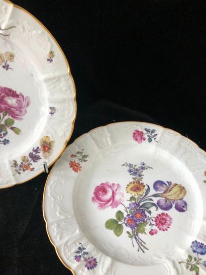 null PARIS. SAMSON. Two PORCELAIN plates of lobed shape with polychrome floral decoration...