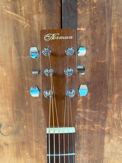 null Folk Guitar branded electro acoustic Norman B20 CW model

Made in Canada Serial...