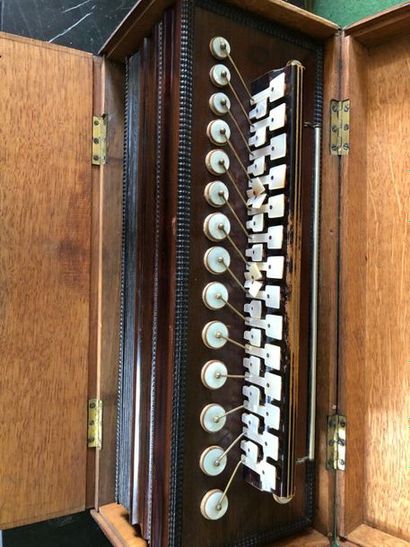 null Diatonic accordion, bearing an iron mark "Dusson, Breveté, Paris" and an old...