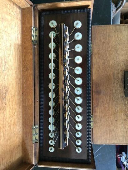 null Diatonic accordion, bearing an iron mark "Dusson, Breveté, Paris" and an old...