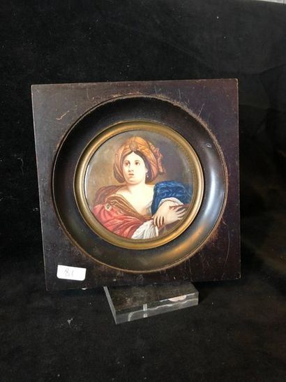 null Round miniature in a frame representing a bust of a woman wearing a turban

Diam...