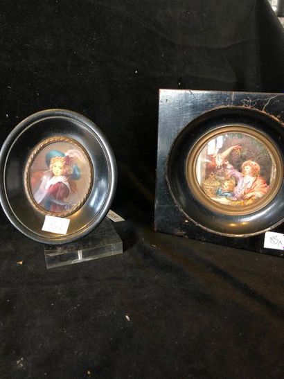 null Set of 2 round miniatures in frames representing

Young woman with sleeve 6x5cm

The...