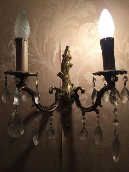 null Pair of Louis XV style sconces with 2 light arms

Height 27cm
