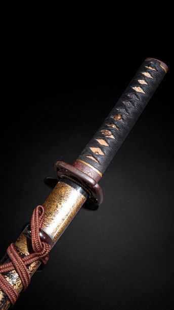 null Katana in its saya (sheath), in red and black lacquer, with a false signature...