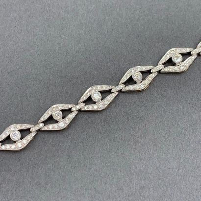 null Lozenge" BRACELET in yellow and white gold (750‰) openwork, set with brilliant-cut...