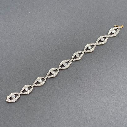 null Lozenge" BRACELET in yellow and white gold (750‰) openwork, set with brilliant-cut...
