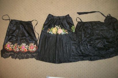 null Skirt and apron Meze Kevesh, Hungary, black satin with polychrome flower embroidery....