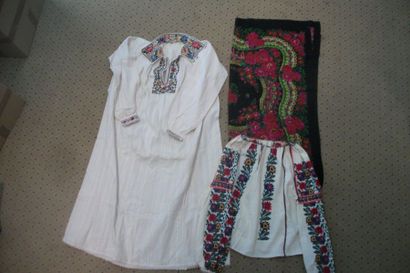 null Two shirts and a shawl, Romania, cotton embroidered polychrome flowers and a...