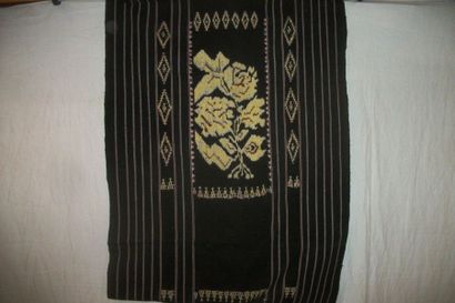 null Sarong, Indonesia, Flores, shaped ikat black, ikat yellow decoration of a sheaf...