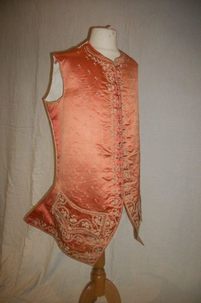 null Waistcoat, 18th century, coral satin embroidered in cream chenille yarn, on...