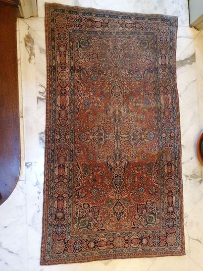 null Kechan or Isfahan carpet, red background with flowers, decorated with a blue...