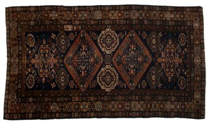 null Caucasian carpet, late 19th early 20th century, blue background, decorated with...