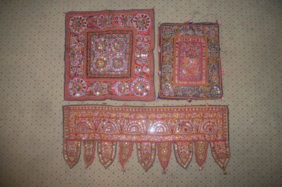 null Combination of a square, a toran and a bag, India, red background, dense polychrome...