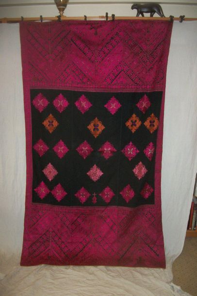 null Swat hanging, Pakistan, black canvas embroidered in fuchsia monochrome with...