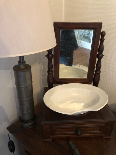 null Lot composed of a small mirror of toilet, a clyster mounted in lamp and a candlestick...