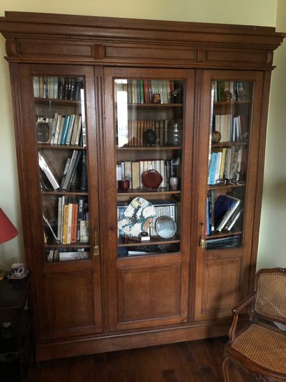 null Natural wood bookcase opening with 3 glass doors

227x170x42cm
