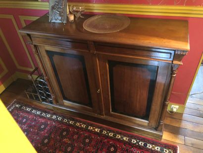 null Sideboard with height of support in natural wood partly stained black

2 doors...