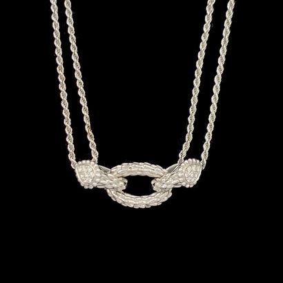 null BOUCHERON 

COLLIER, modèle " Bohème ", en or gris (750‰) ajouré, partiellement...