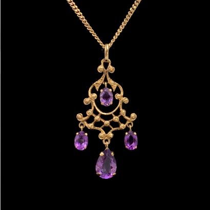 null Yellow gold (750‰) openwork "arabesque" pendant and its chain "fine gourmette...