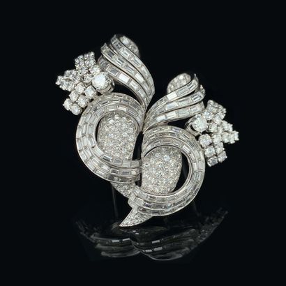 null Important Pair of detachable "stylized scroll" CORSAGE CLIPS in openwork platinum...
