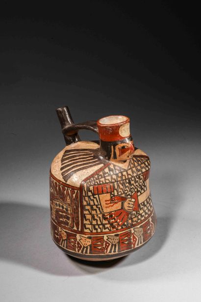 null Anthropomorphic vase

The dignitary wears a tunic with black and white geometric...