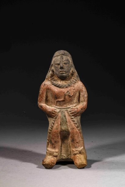 null Ceremonial whistle representing a standing dignitary

Brown terracotta with...