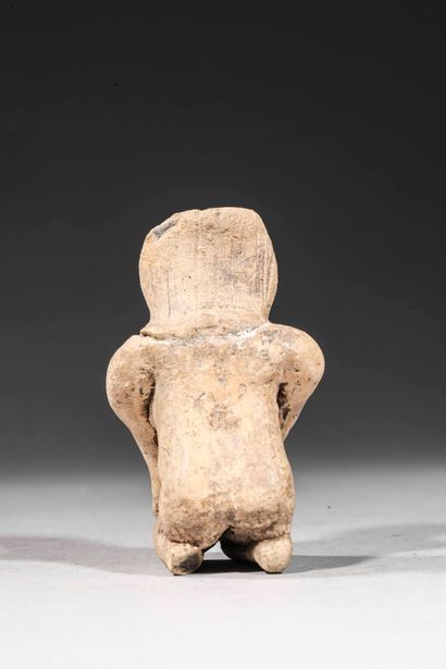null Crouching pregnant woman

Brown terracotta

Michoacan culture, Mexico

100 BC...
