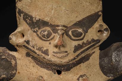 null Poupée

Terre cuite beige à décor peint noir

Culture Chancay, Pérou

1100 -...
