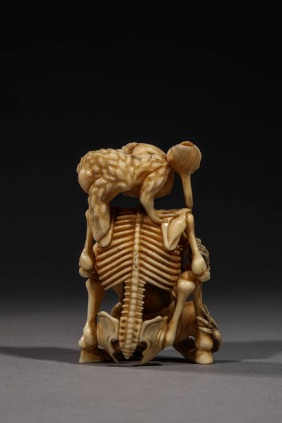 null Japan, late 11th or early 20th century

"Sitting skeleton with a toad on his...