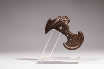 null Set of two hammer axes decorated with animal heads spitting the blade, of the...