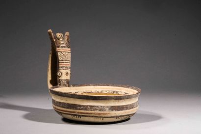 null Kyathos with anthropomorphic handle.

Beige terracotta with brown and ochre...