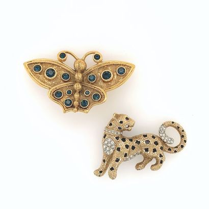 null CHRISTIAN DIOR 

BROCHE " papillon " en métal orné de pierres de couleur. Signée...