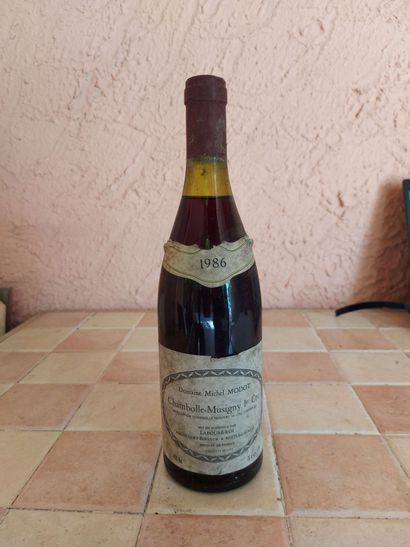 null BOURGOGNE CHAMBOLLE MUSIGNY 1ER CRU		

MICHEL MODOT	

ROUGE 	75CL	 1986 	B.G	...