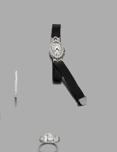 null BRACELET WATCH oval lady in platinum (950‰) Geometric attachments and bezel...
